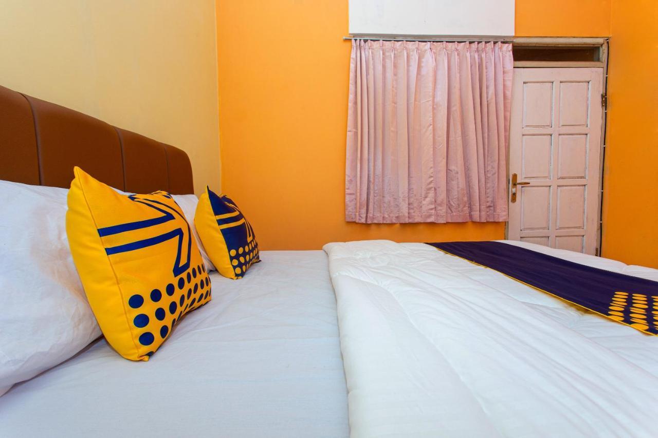 Spot On 2697 Homy House Hotel